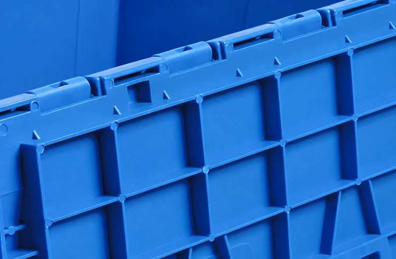 Lid rib structure — Attached-lid containers
